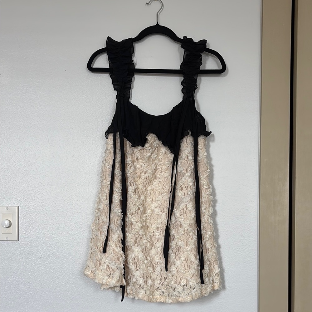 Black and Cream Sleeveless Ruffle Dress